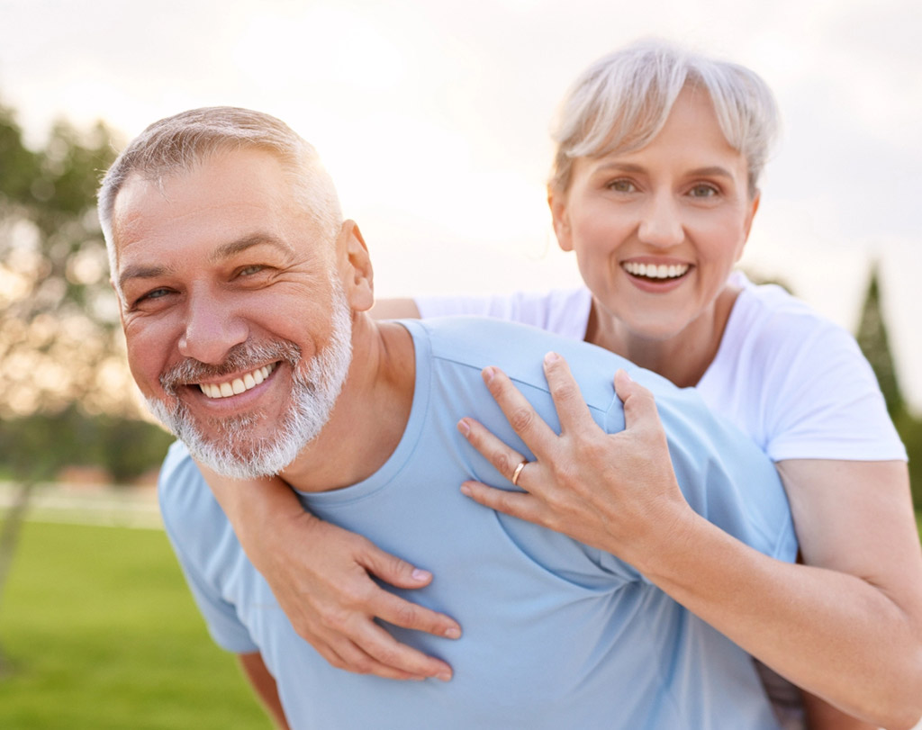 Older couple smiling mobile