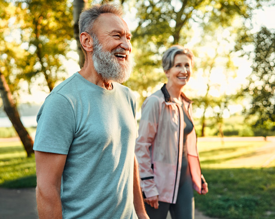 Healthy elderly couple walking