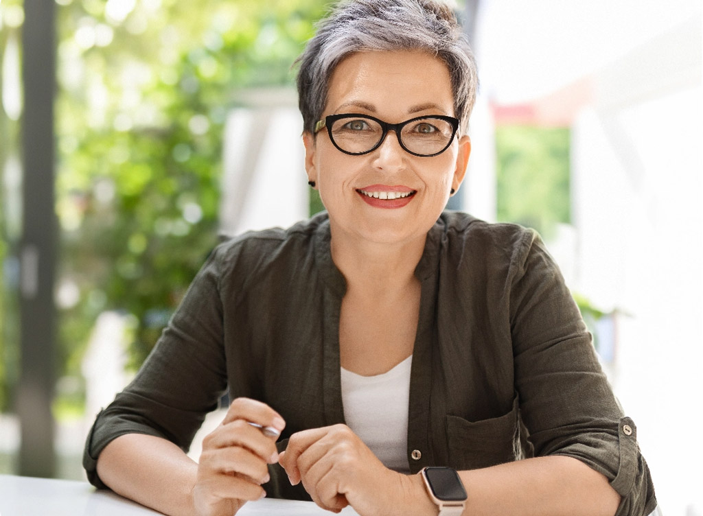 Older woman with glasses mobile